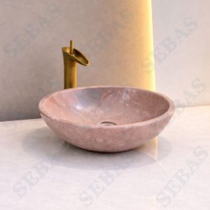 Chậu lavabo đá tự nhiên kiểu tô với nhiều màu và nhiều vân lạ phù hợp với không gian phòng tắm rộng rãi hay thiết kế ngoài trời Lavabo đá tự nhiên màu hồng ý